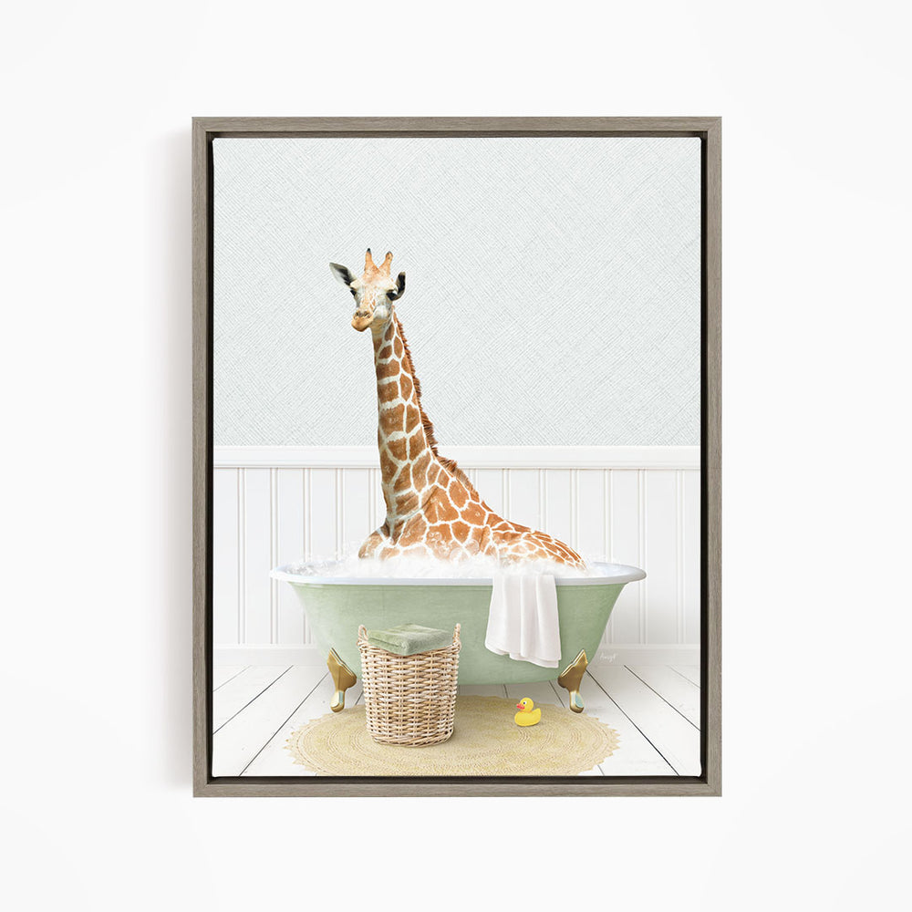 A giraffe sitting in a green bathtub filled with water, surrounded by a basket of toys and a yellow rubber duck.