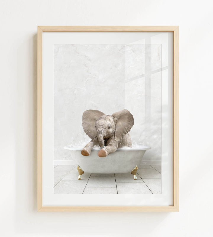 A baby elephant sitting in a white bathtub, with its trunk raised and ears spread out, creating a playful and whimsical scene.