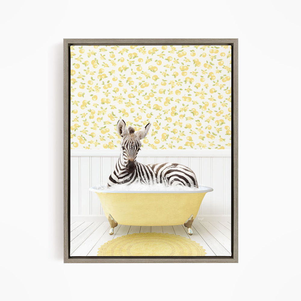 A zebra is sitting in a yellow bathtub, surrounded by a yellow and white floral pattern on the wall behind it.