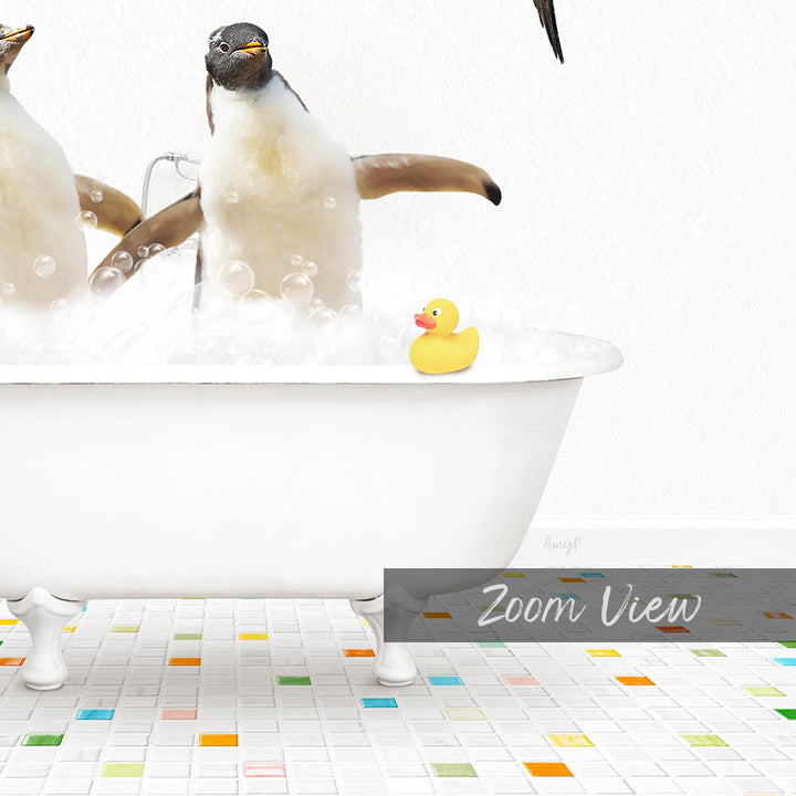 A white bathtub filled with bubbles, with two penguins standing in it and a yellow rubber duck floating on the water.
