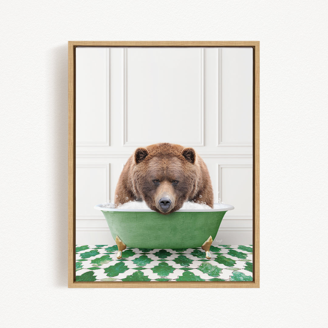 A brown bear is sitting in a green bathtub filled with water, appearing to enjoy the bath.