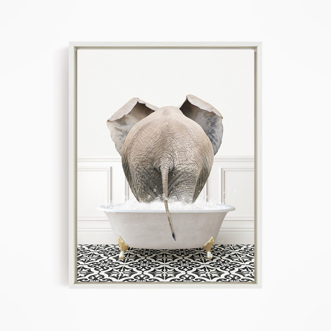 A large elephant is standing in a bathtub filled with water, creating a whimsical and playful scene.