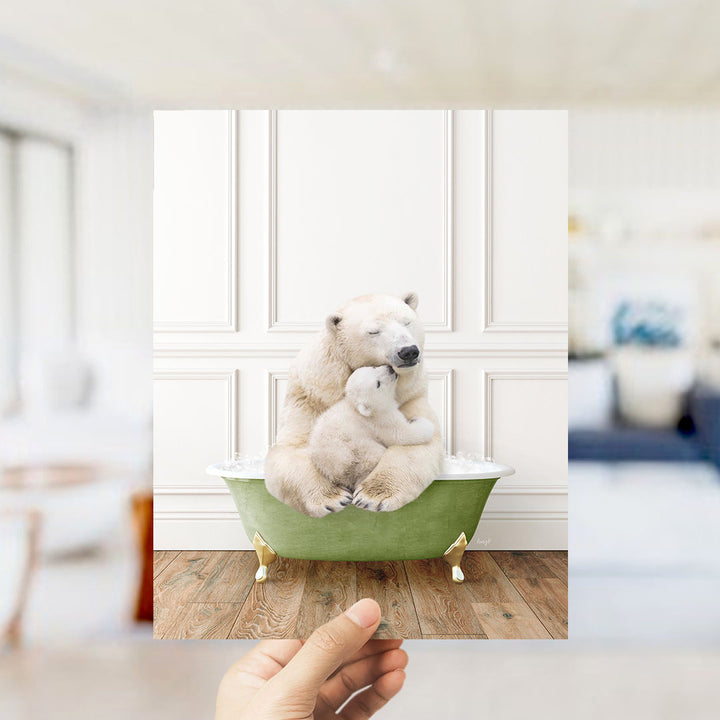 A polar bear and its cub cuddling in a green bathtub, with a blurred background suggesting a cozy indoor setting.