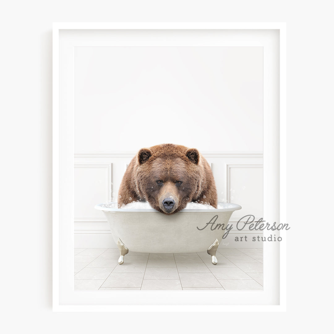 a brown bear is taking a bath in a bathtub