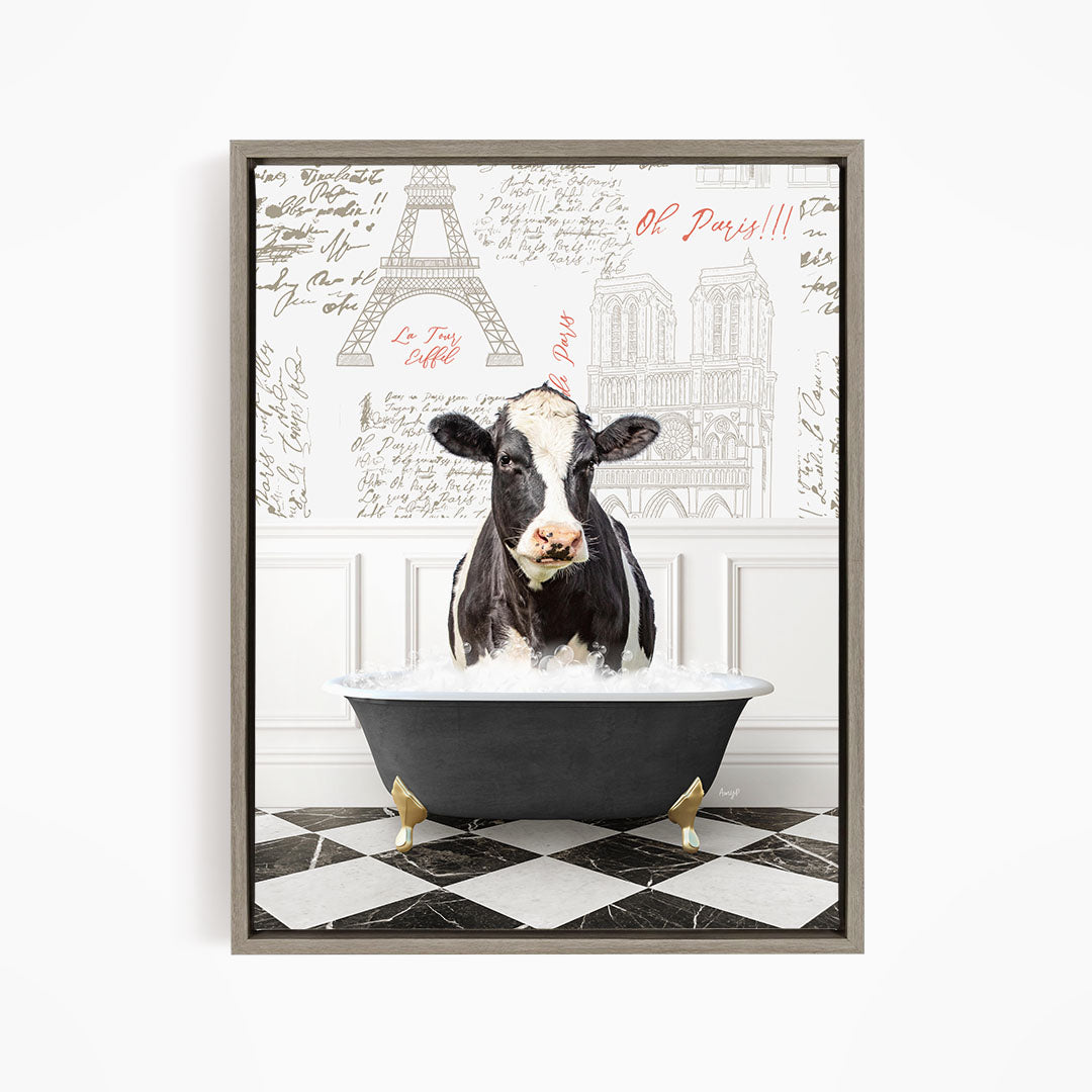 A black and white cow is sitting in a bathtub filled with water, surrounded by a Paris-themed background with the Eiffel Tower and other landmarks.