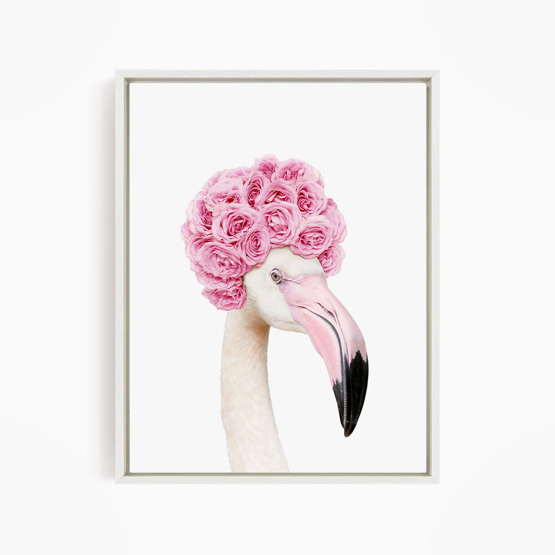 A flamingo with a pink flower crown on its head.