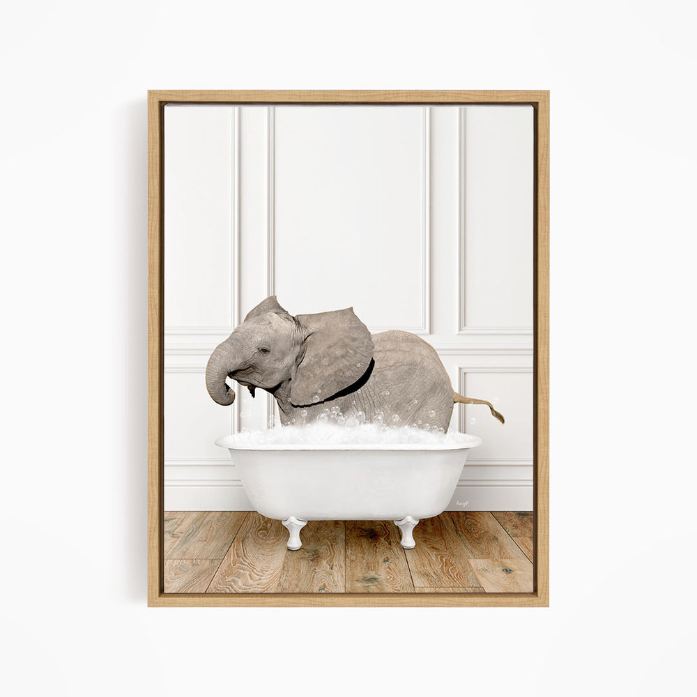 A gray elephant is sitting in a white bathtub filled with water, creating a whimsical and playful scene.