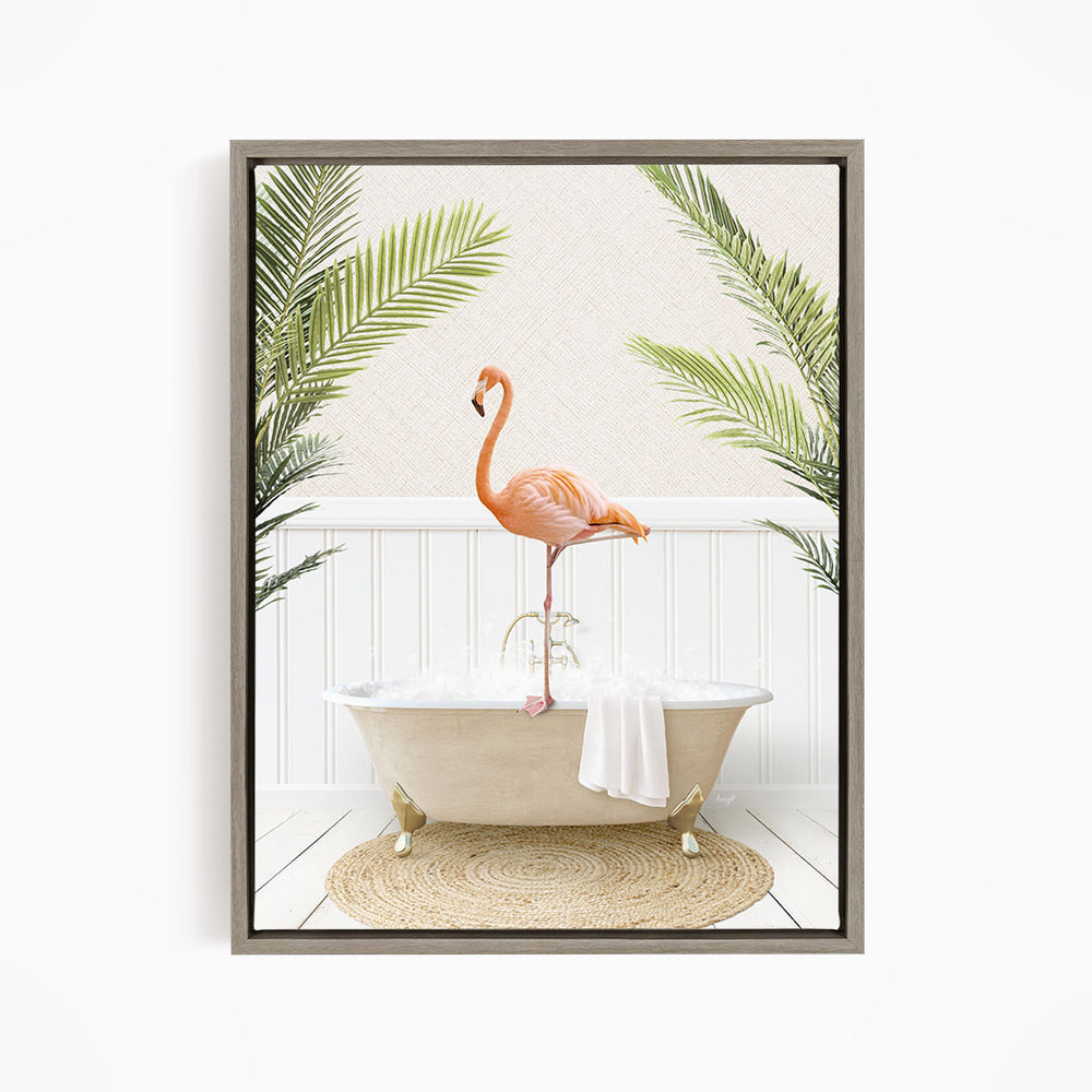 A framed image depicting a pink flamingo standing on a white bathtub, surrounded by green palm leaves.