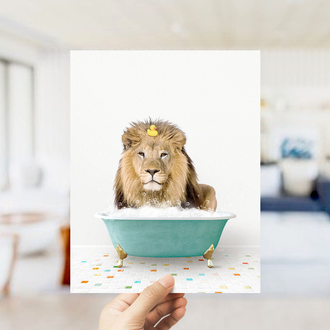 A lion is sitting in a green bathtub filled with bubbles, with a yellow rubber duck floating on its head.