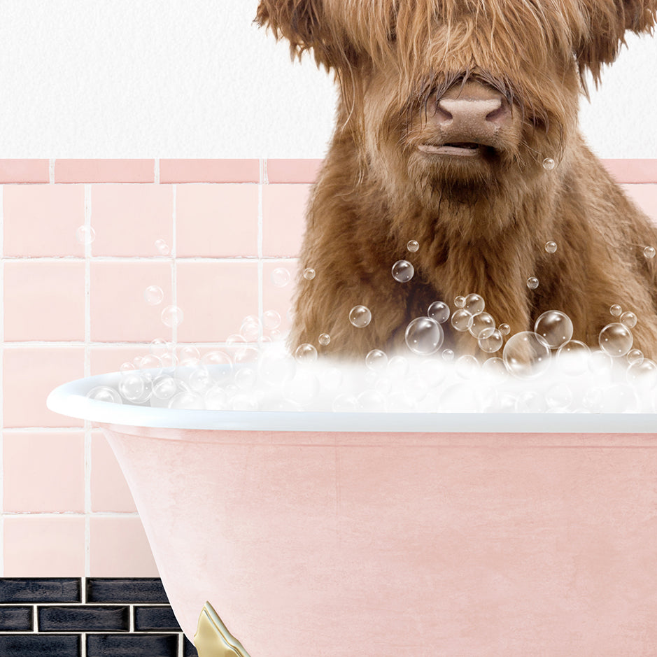 a brown dog sitting in a bathtub filled with bubbles