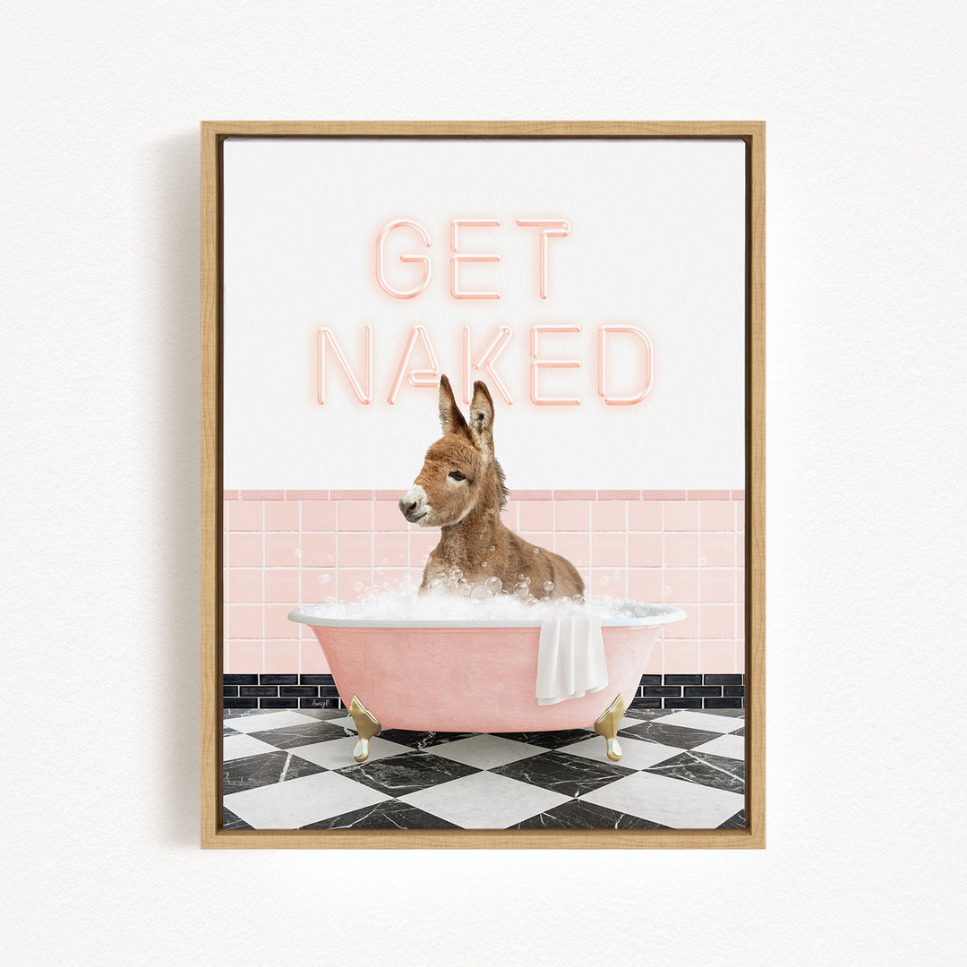 A donkey sitting in a pink bathtub with the text "GET NAKED" displayed above it.
