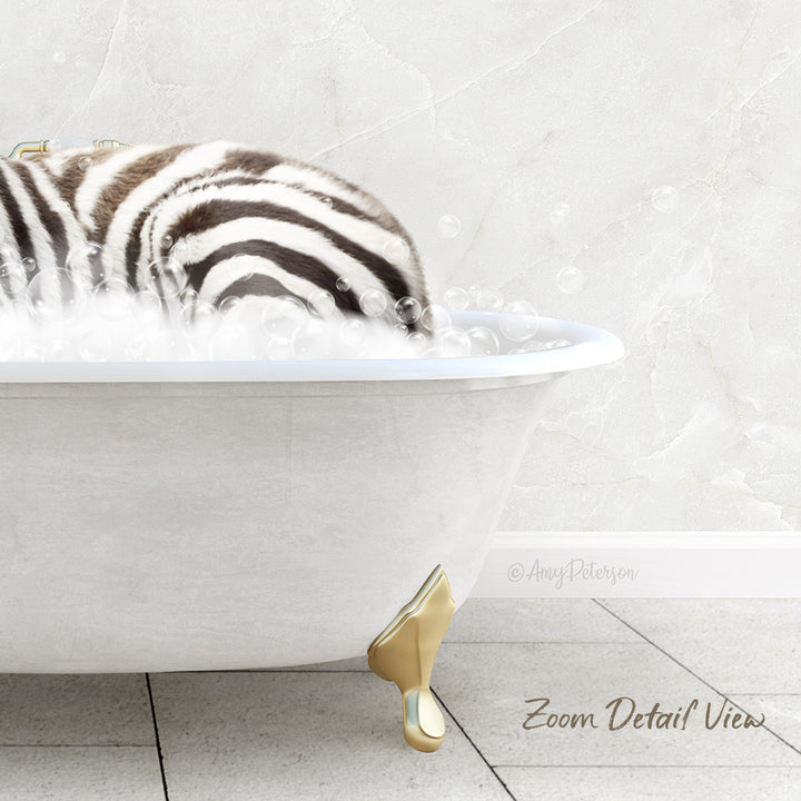 A zebra lying in a white bathtub filled with bubbles, with a gold claw visible on the side of the tub.