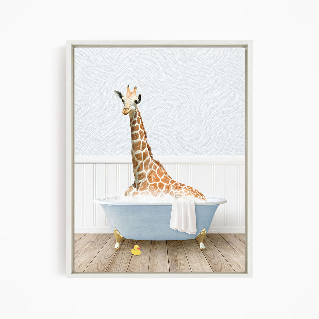 A giraffe sitting in a blue bathtub filled with water, surrounded by a white wall and wooden floor.