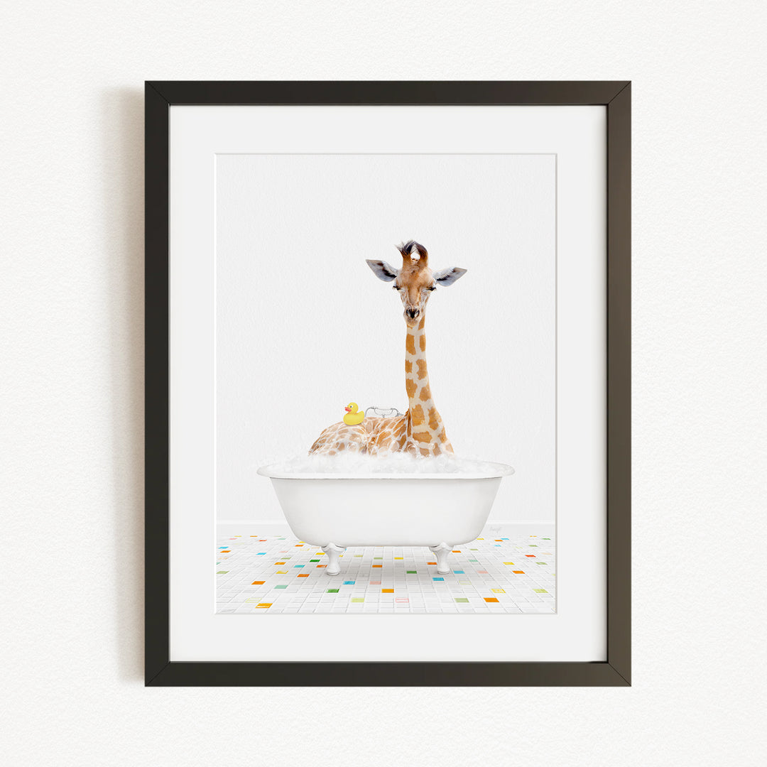 A giraffe sitting in a white bathtub filled with bubbles, surrounded by a colorful tiled floor.