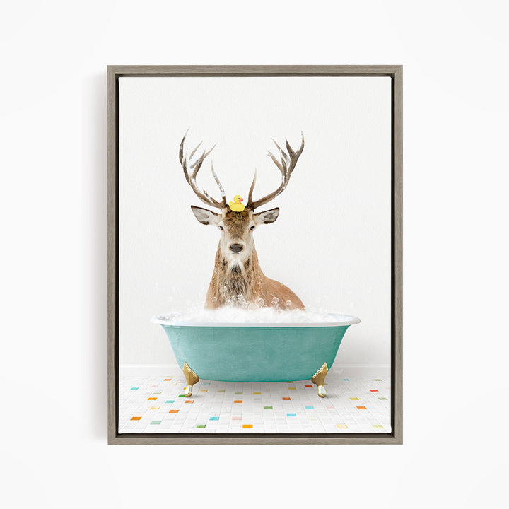 A deer with antlers is sitting in a blue bathtub, with a yellow rubber duck perched on its head.