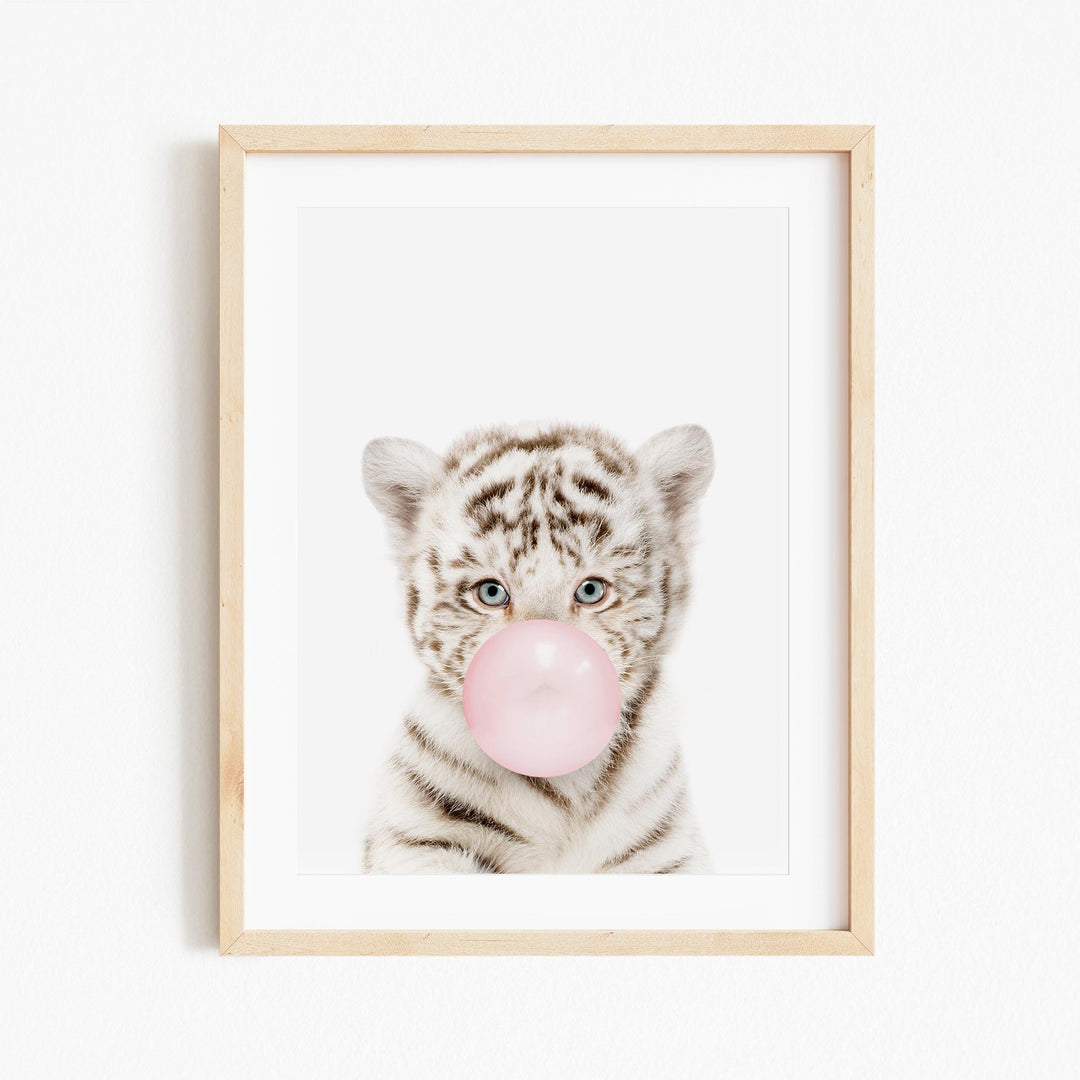 a picture of a white tiger with a bubble gum