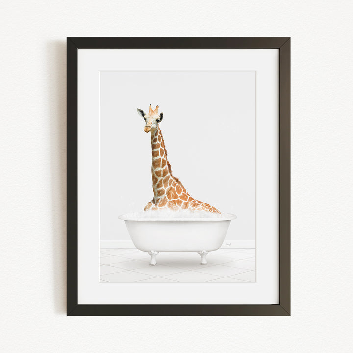 A giraffe sitting in a white bathtub, with its head and neck submerged in the water.