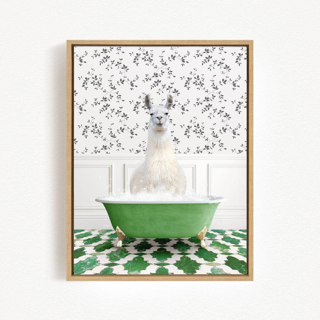 A white llama sitting in a green bathtub filled with bubbles, surrounded by a patterned wall and green and white floor tiles.