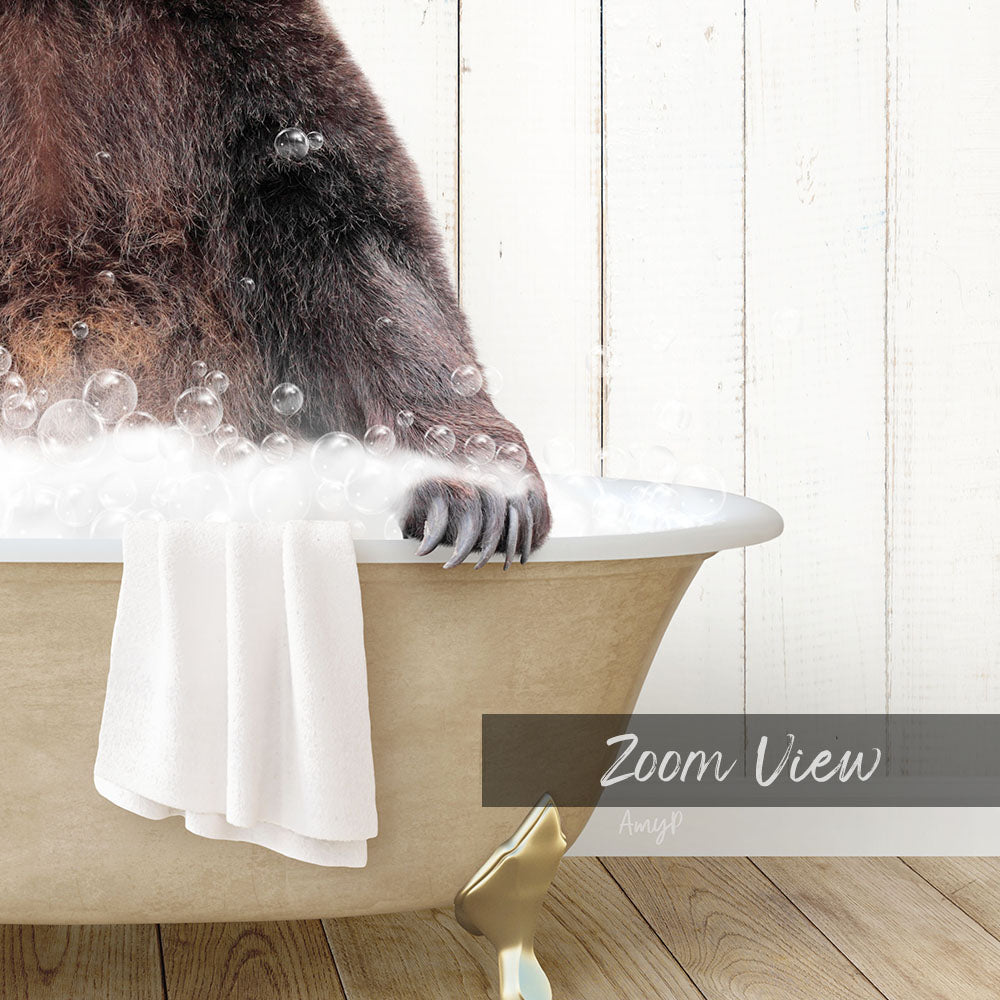A close-up of a bear's paw in a bathtub filled with bubbles, with a towel and text overlay.