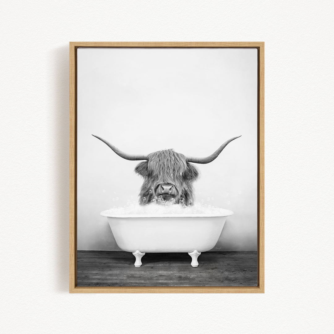 A black and white photograph of a long-haired animal, possibly a yak or a similar species, sitting in a white bathtub and enjoying a bath.