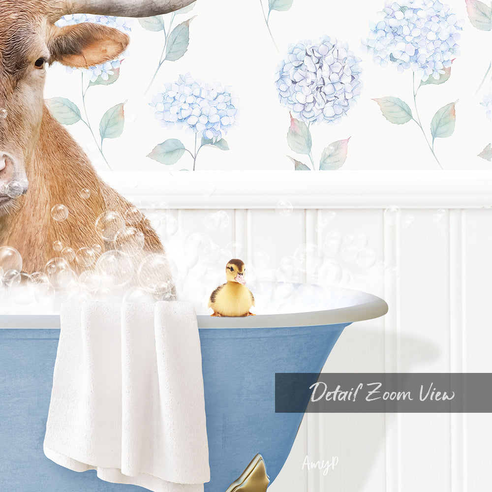 A brown cow is sitting in a blue bathtub filled with bubbles, with a small yellow duck sitting on the edge of the tub.