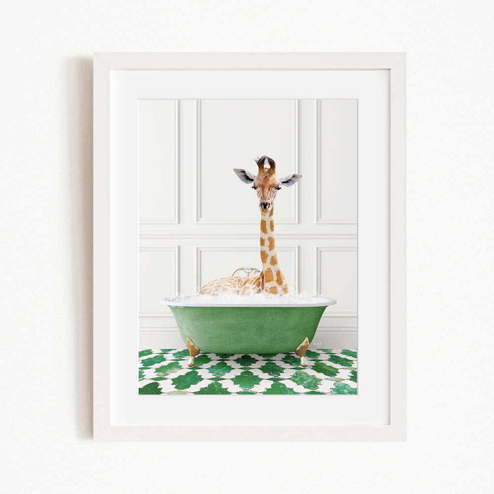 A giraffe is sitting in a green bathtub filled with bubbles, creating a whimsical and playful scene.