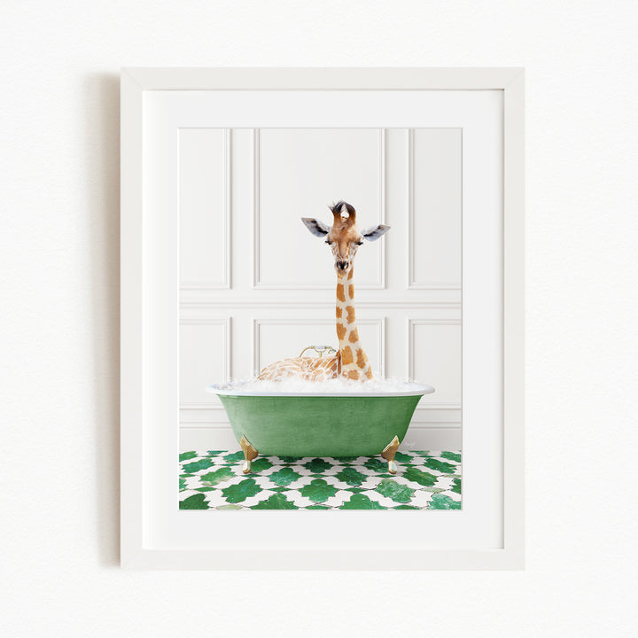 A giraffe is sitting in a green bathtub filled with bubbles, creating a whimsical and playful scene.