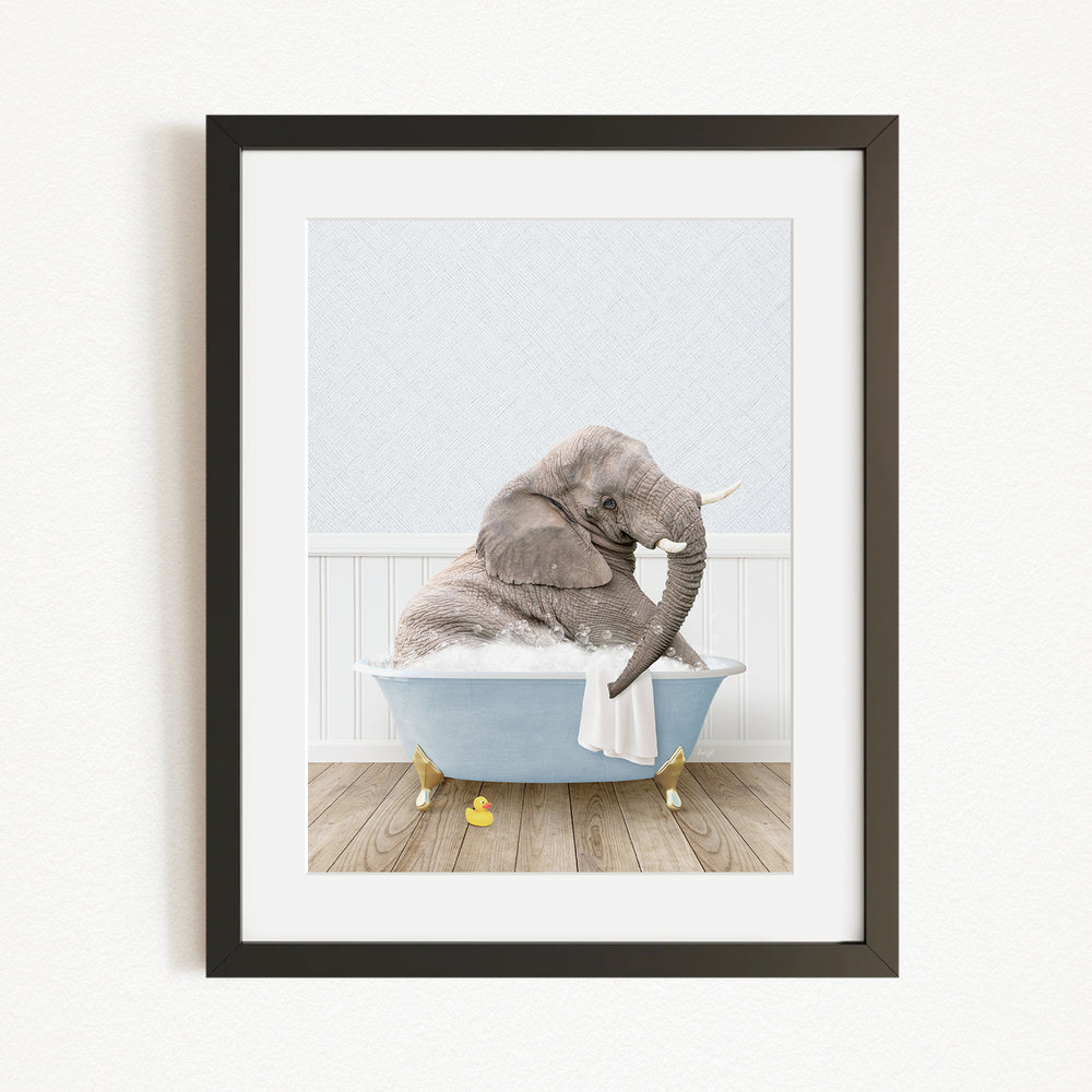 A gray elephant sitting in a blue bathtub filled with water, surrounded by yellow rubber duckies.