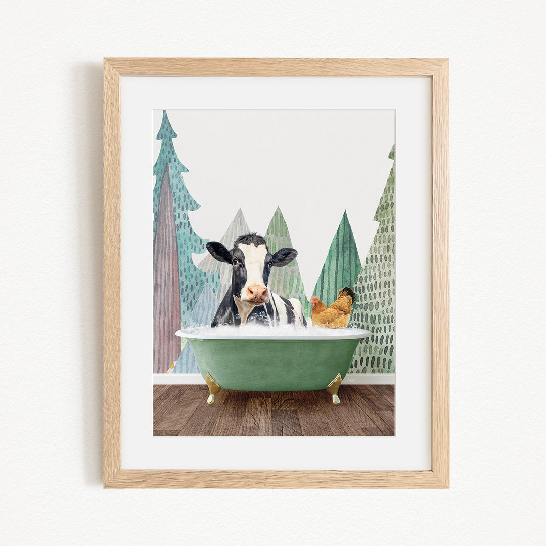 A black and white cow is sitting in a green bathtub, surrounded by a chicken and a tree, with a forest-like background.