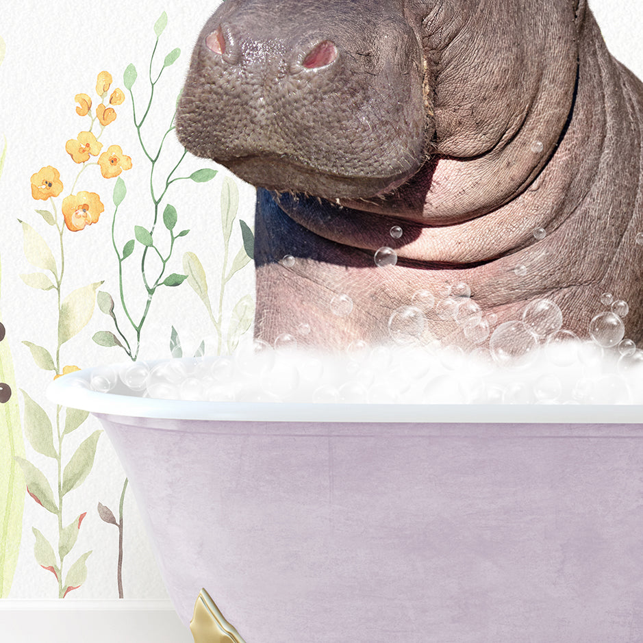 a hippopotamus sitting in a bathtub with bubbles