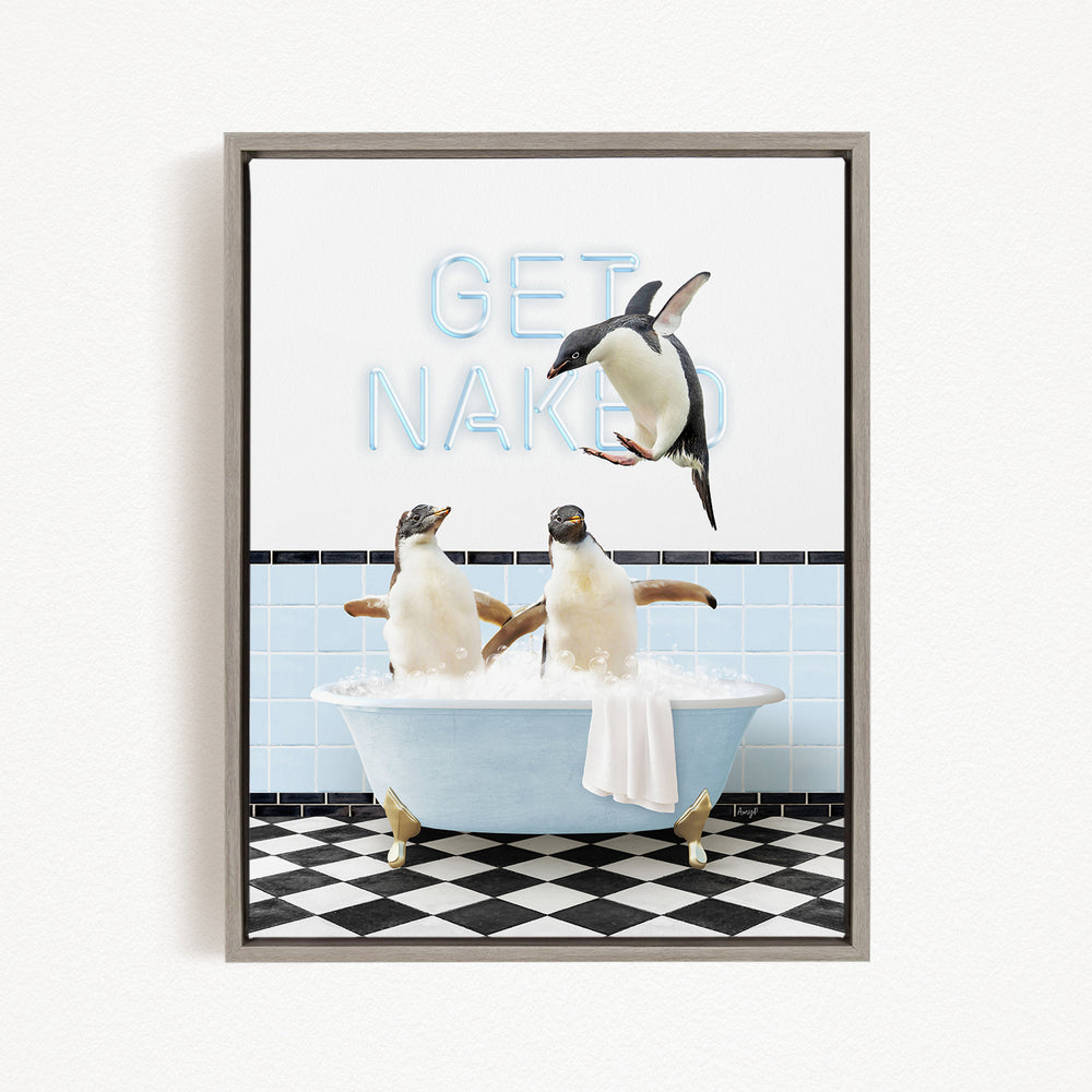 A framed image depicting two penguins sitting in a bathtub, with one penguin flying towards the other penguin. The text "GET NAKED" is displayed above the penguins.