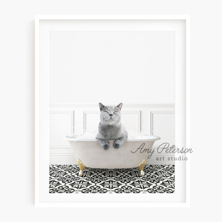 a cat sitting in a bathtub with a black and white background