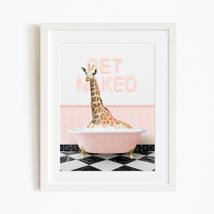 A giraffe sitting in a pink bathtub with the words "GET NAKED" written on the wall behind it.
