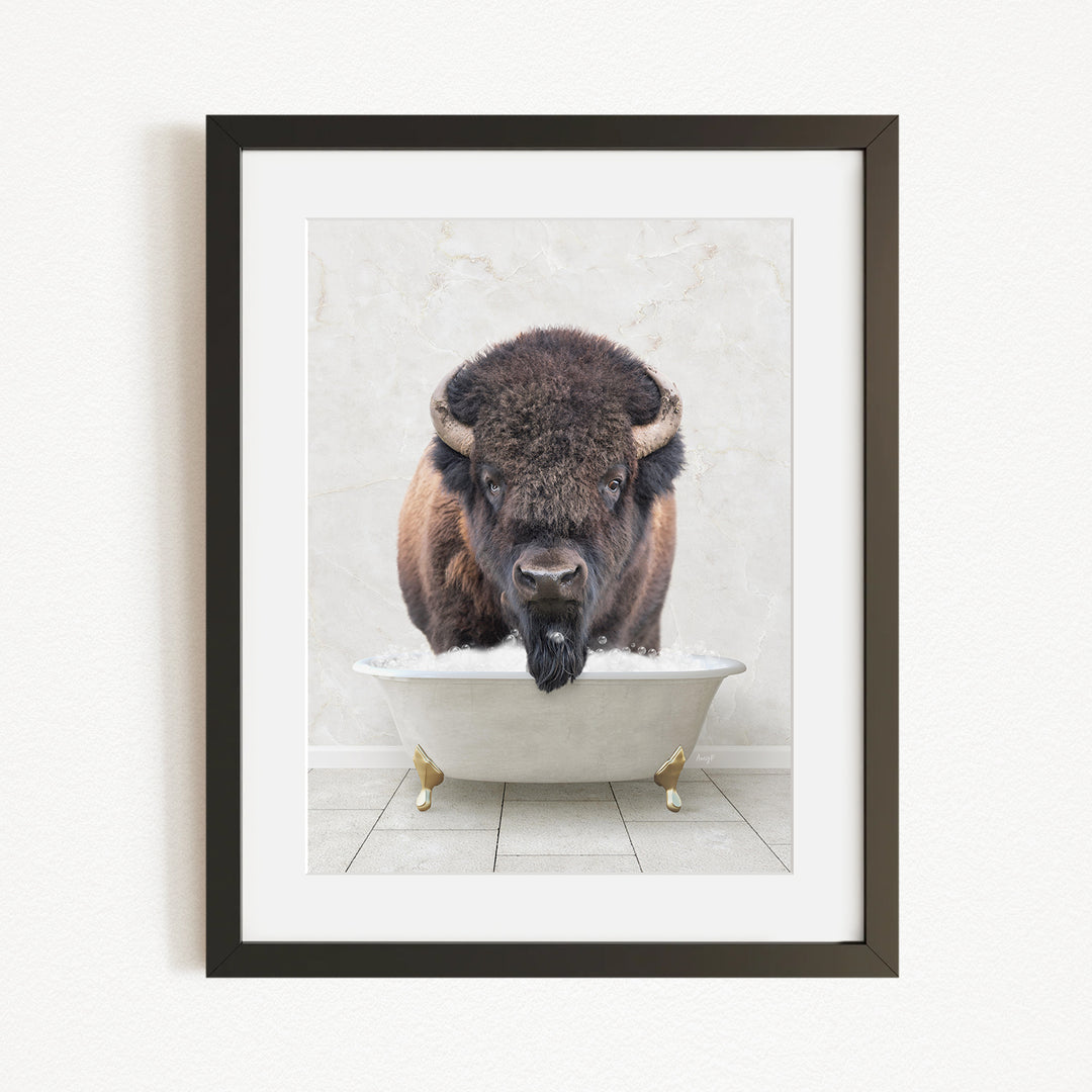 A buffalo with a long, shaggy mane is standing in a white bathtub filled with water, appearing to be enjoying a bath.