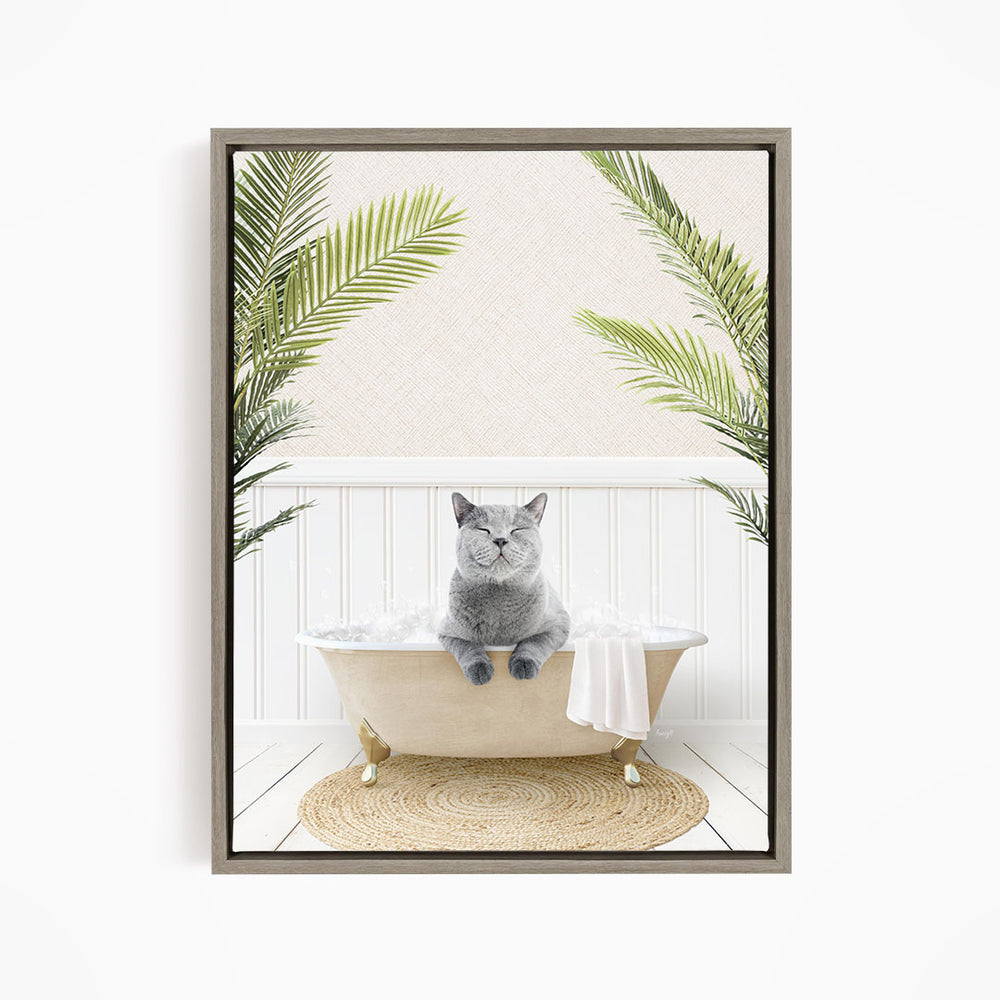 A gray cat sitting in a bathtub filled with bubbles, surrounded by green palm leaves, creating a whimsical and relaxing scene.