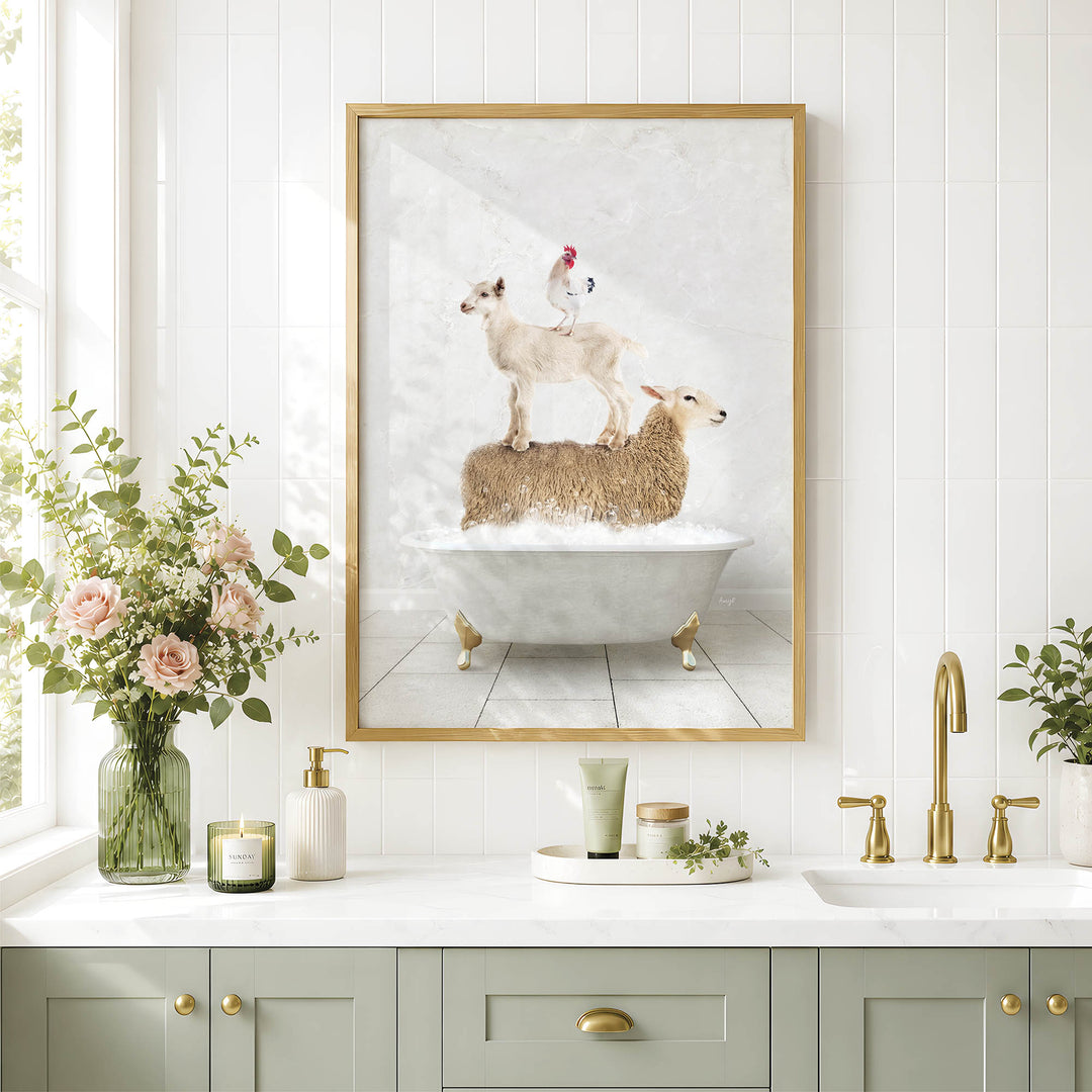 a bathroom scene with a framed picture of a sheep standing on a tub, a chicken perched on the sheep, and a vase of flowers on the counter.