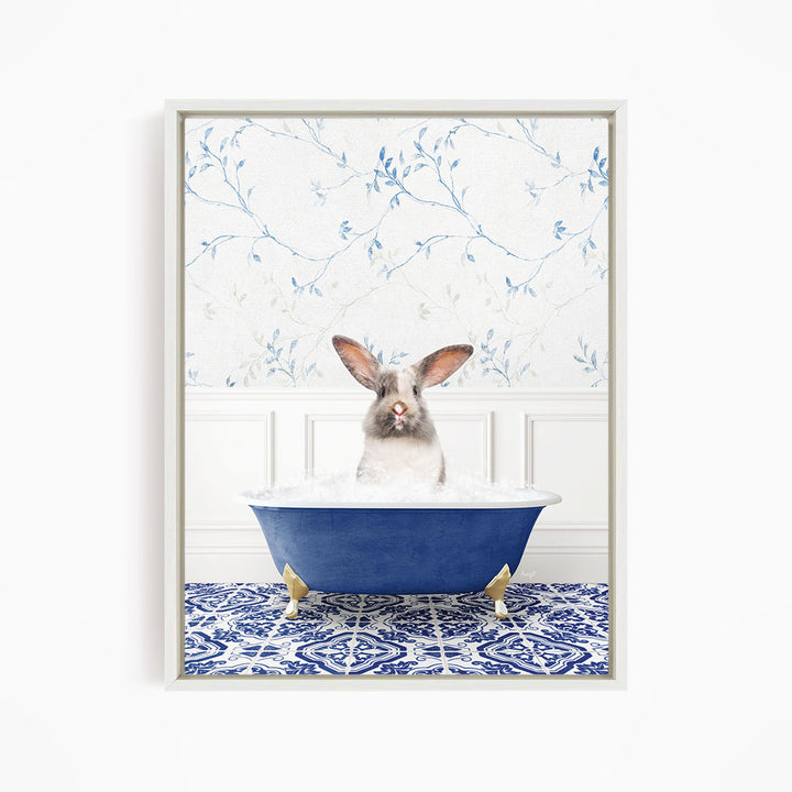 A white rabbit sitting in a blue bathtub filled with water, with a patterned tile floor in the background.
