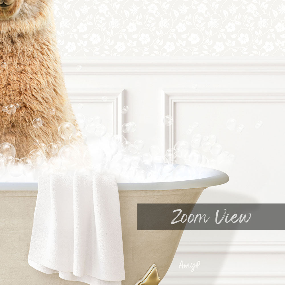 A fluffy brown cat sitting in a bathtub filled with bubbles, with a towel draped over the side.