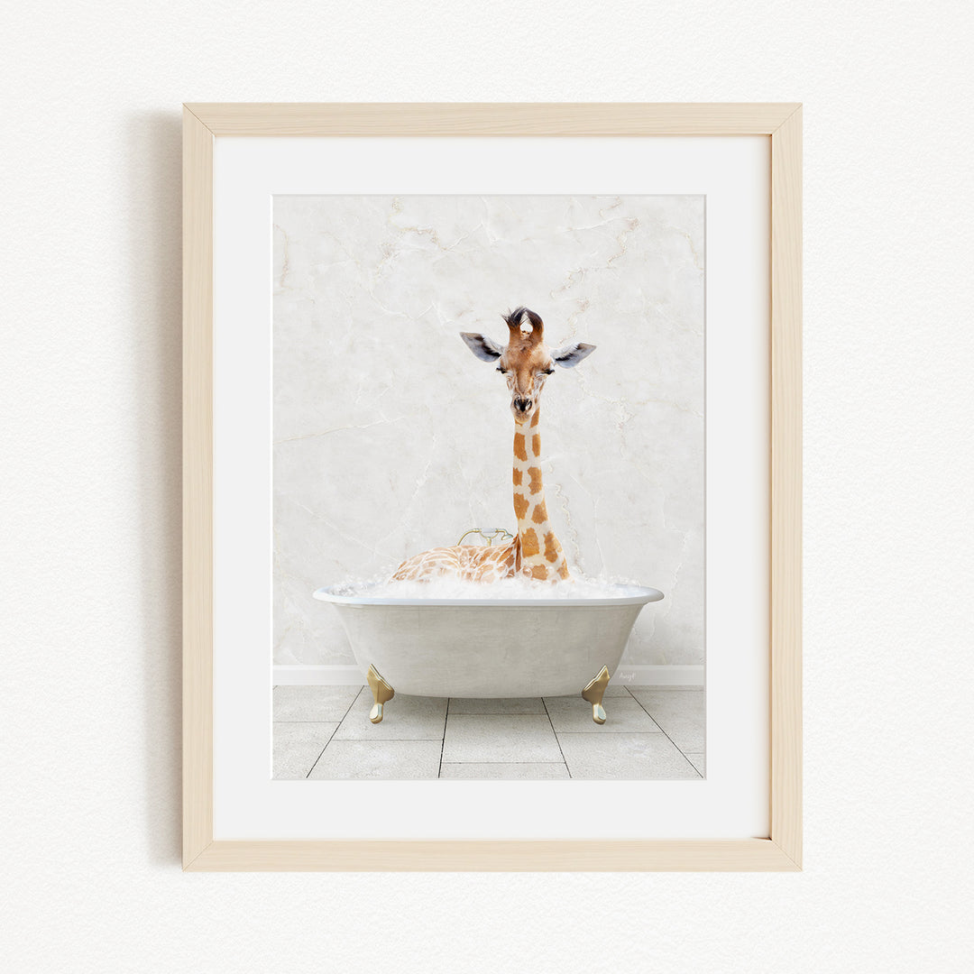 A giraffe standing in a white bathtub filled with bubbles, creating a whimsical and playful scene.
