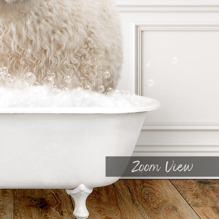A fluffy white dog is sitting in a white bathtub filled with bubbles, creating a cozy and relaxing scene.