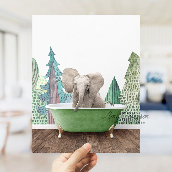 a hand holding up a card with an elephant in a bathtub