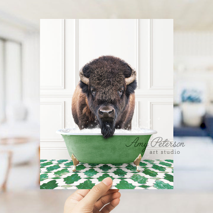 a bison sticking its head in a green bowl