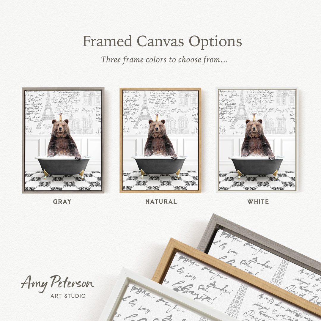 The image is a framed canvas option featuring three different colored frames with a central image of a bear sitting in a bathtub.