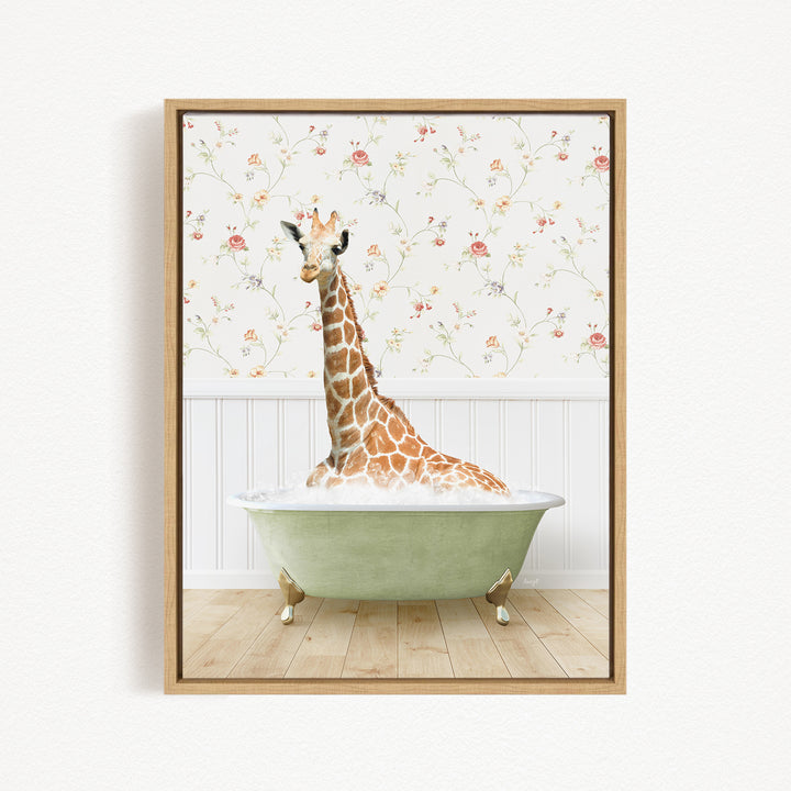 A giraffe sitting in a green bathtub, surrounded by a floral wallpaper.