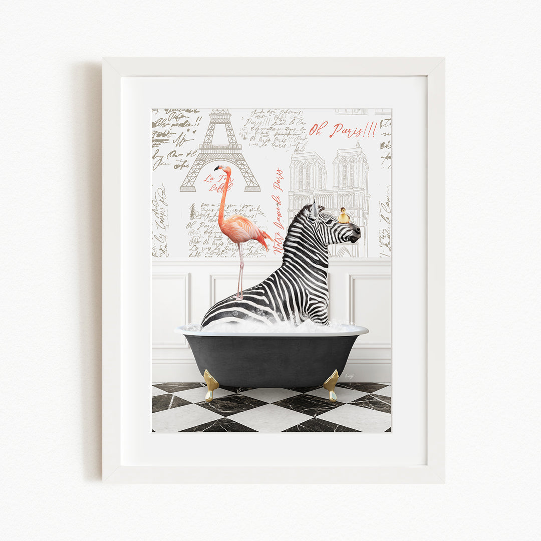 A framed image depicting a zebra sitting in a bathtub, with a pink flamingo standing on its back. The background features a black and white checkered floor and the Eiffel Tower.