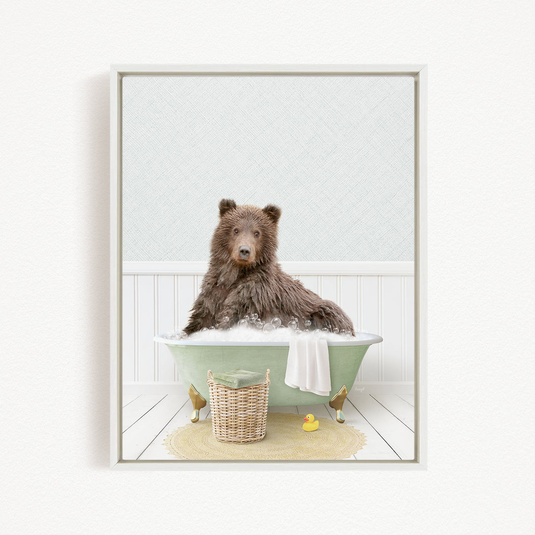 A brown bear sitting in a green bathtub filled with bubbles, surrounded by rubber ducks and a basket.