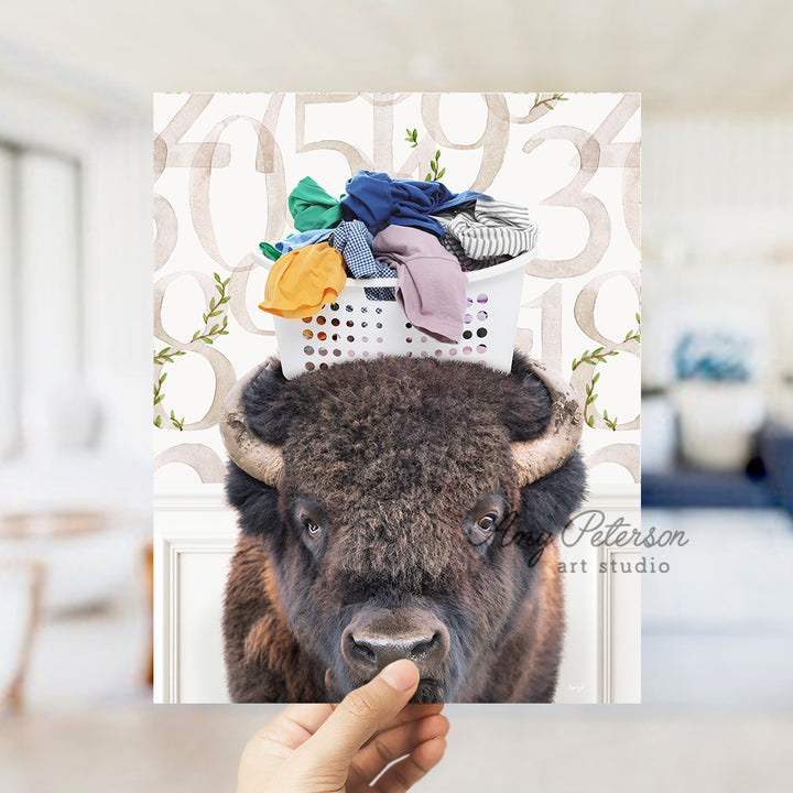 a bison with a basket of clothes on its head