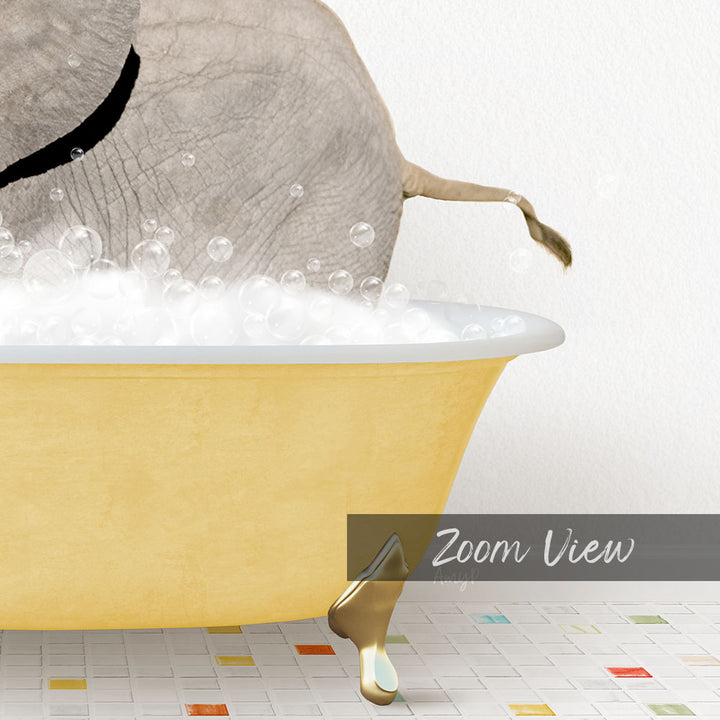 A large elephant is taking a bath in a yellow bathtub, surrounded by bubbles.