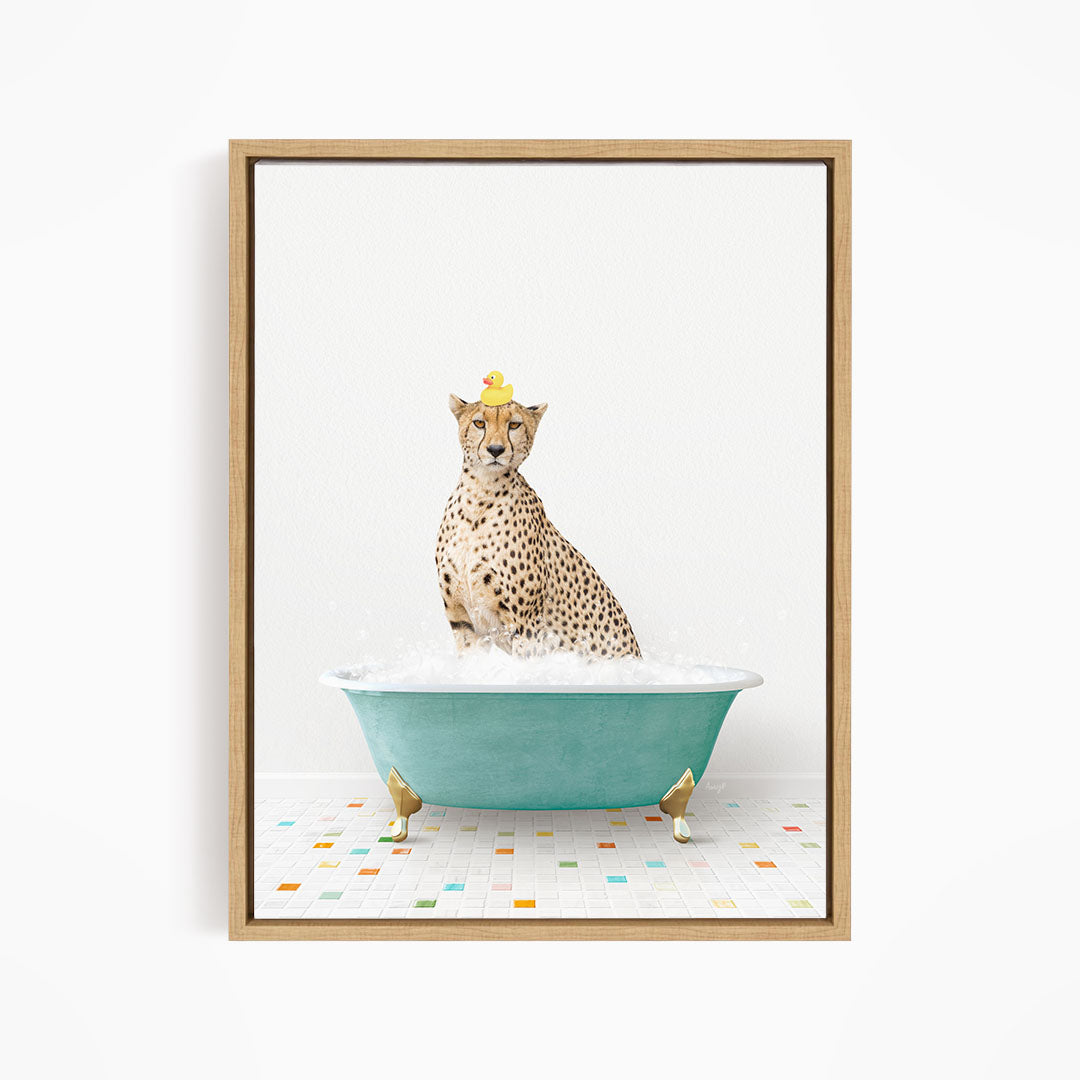 A cheetah sitting in a blue bathtub filled with water, with a yellow rubber duck perched on its head.