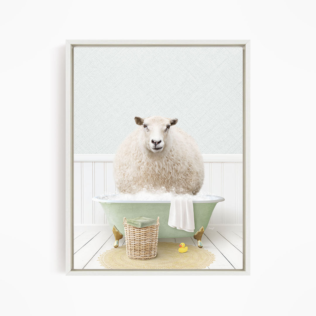 A fluffy white sheep sits in a green bathtub filled with bubbles, surrounded by a yellow rubber duck and a wicker basket.